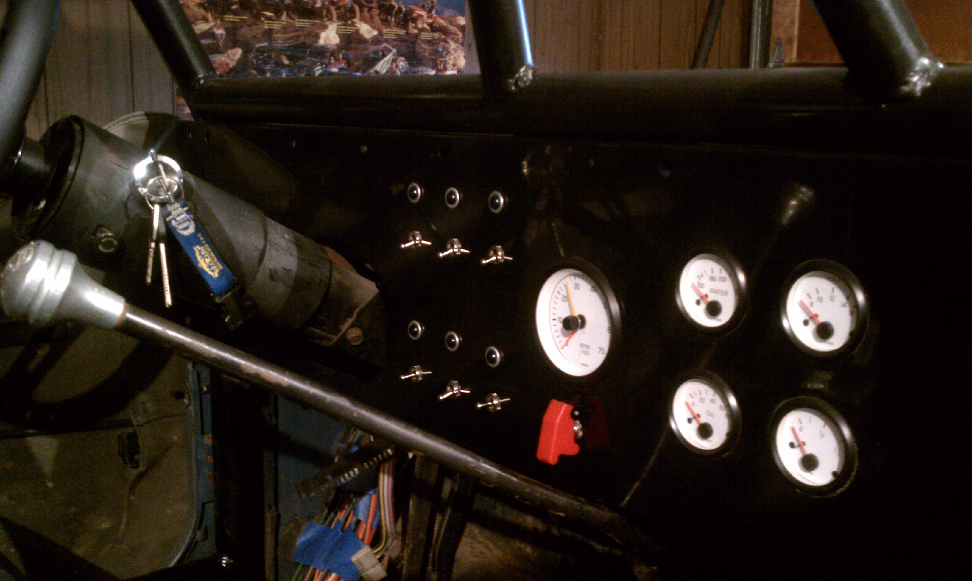 Mounted my switches in the dash, I can just reach them when I'm fully strapped in tight.