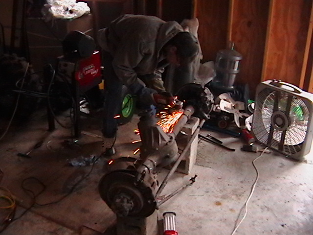 Dana's brother working on front spring perches